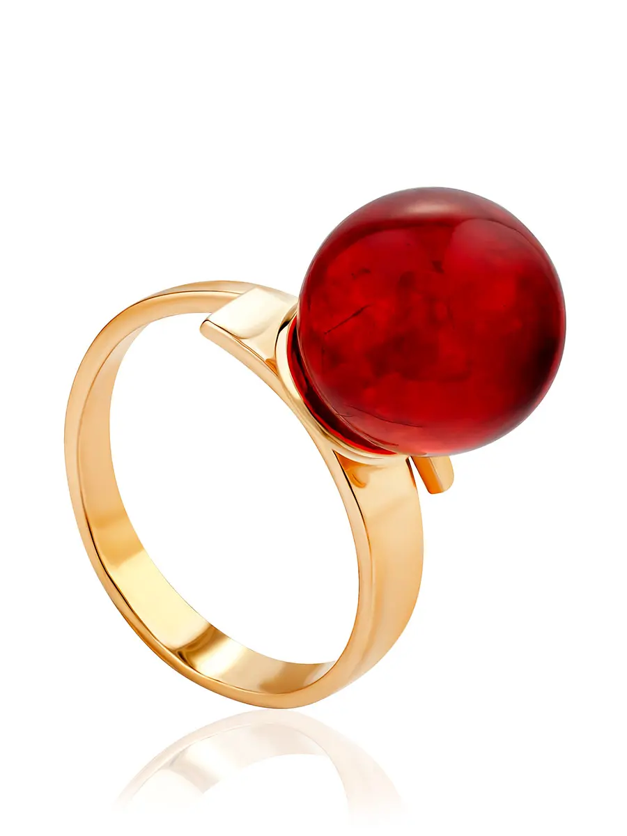 картинка Лаконичное кольцо позолоченное кольцо «Юпитер» с ярко-красным янтарём в онлайн магазине