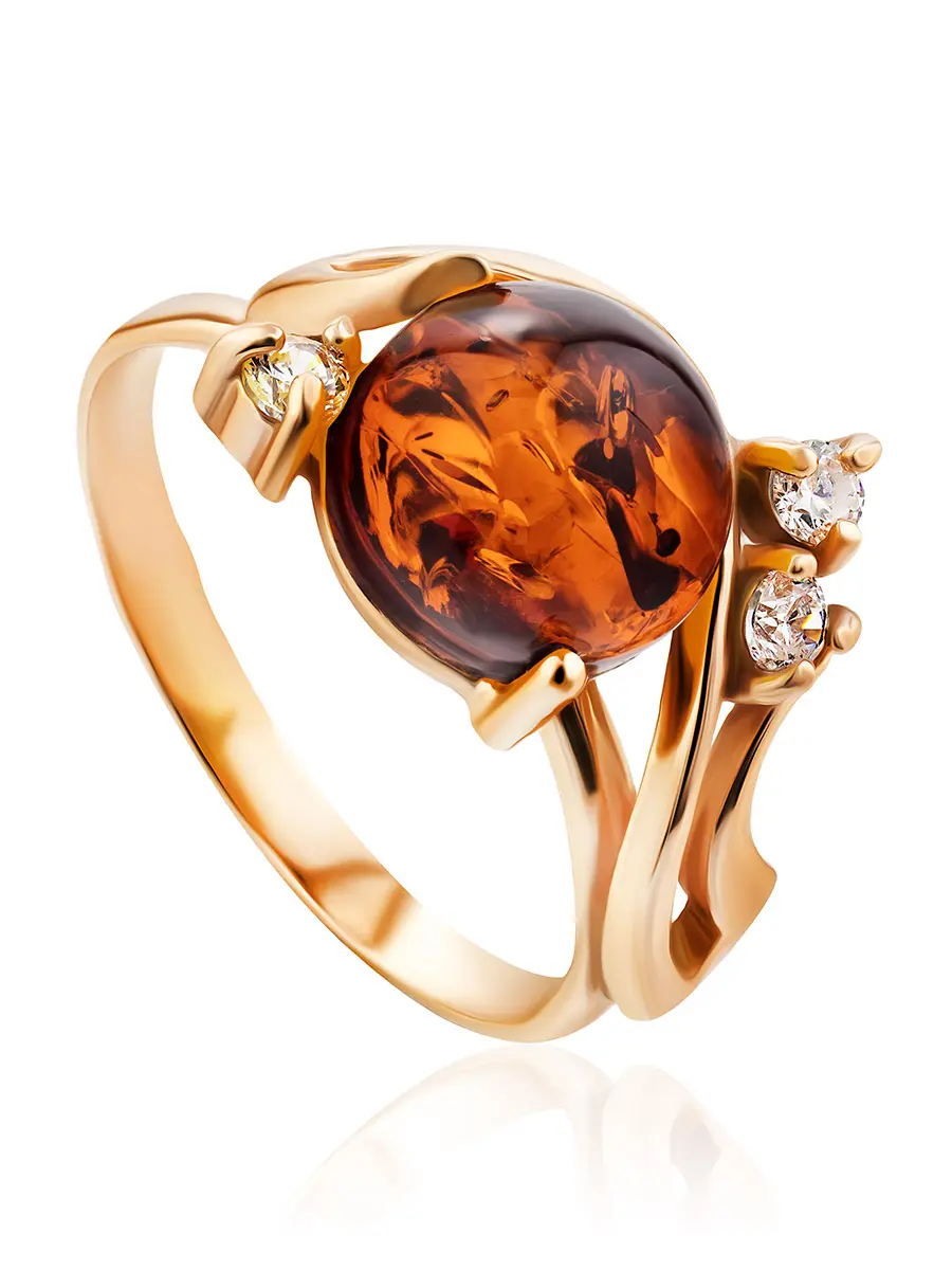 картинка Изящное нарядное кольцо из золота, украшенное натуральным янтарём и цирконами «Ноктюрн» в онлайн магазине