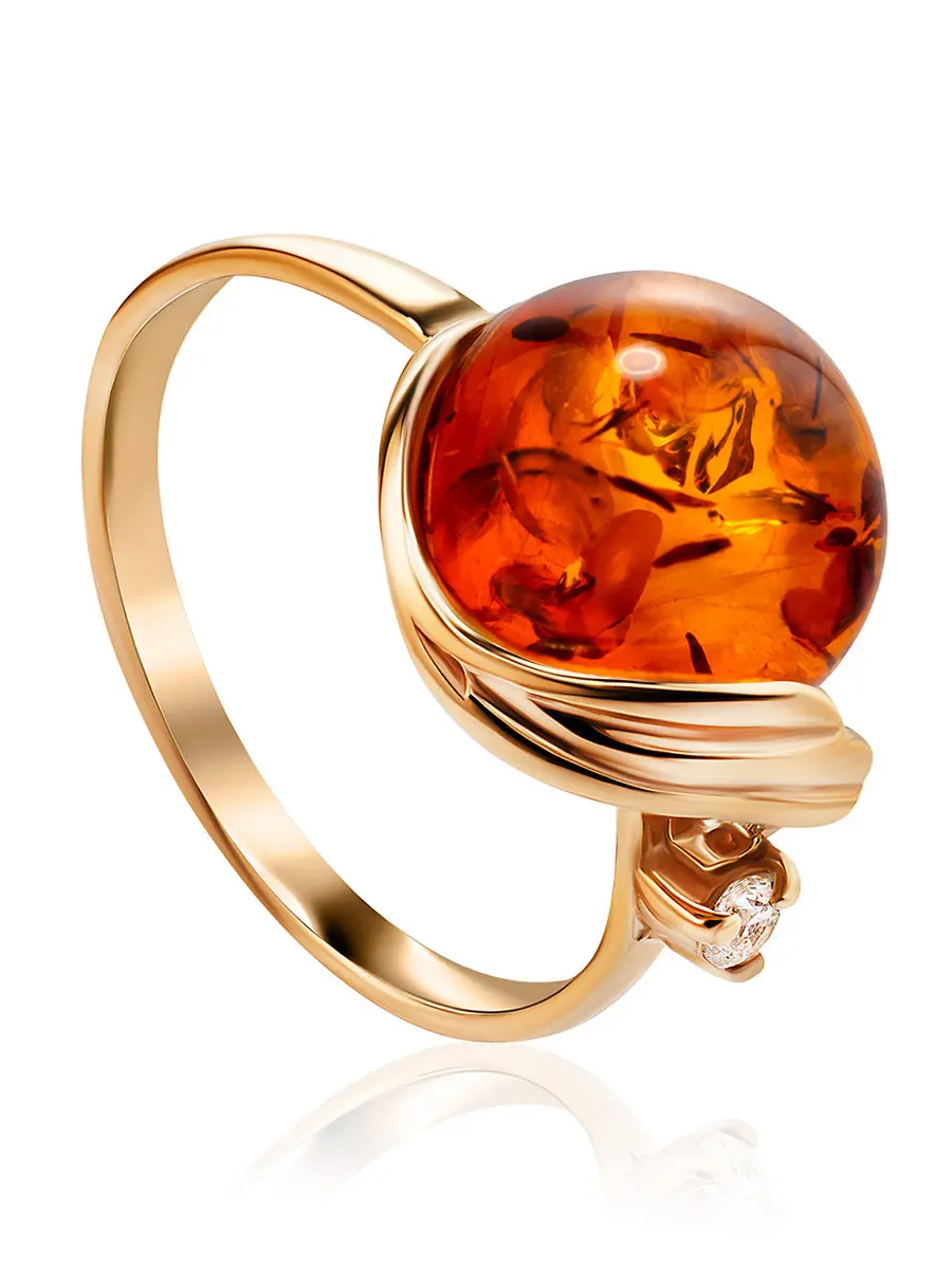 картинка Яркое кольцо из золота и натурального янтаря коньячного цвета «Лебедь» в онлайн магазине
