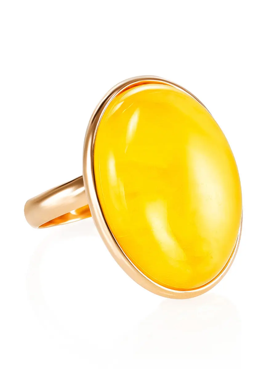 картинка Восхитительное кольцо из позолоченного серебра и натурального медового янтаря в онлайн магазине