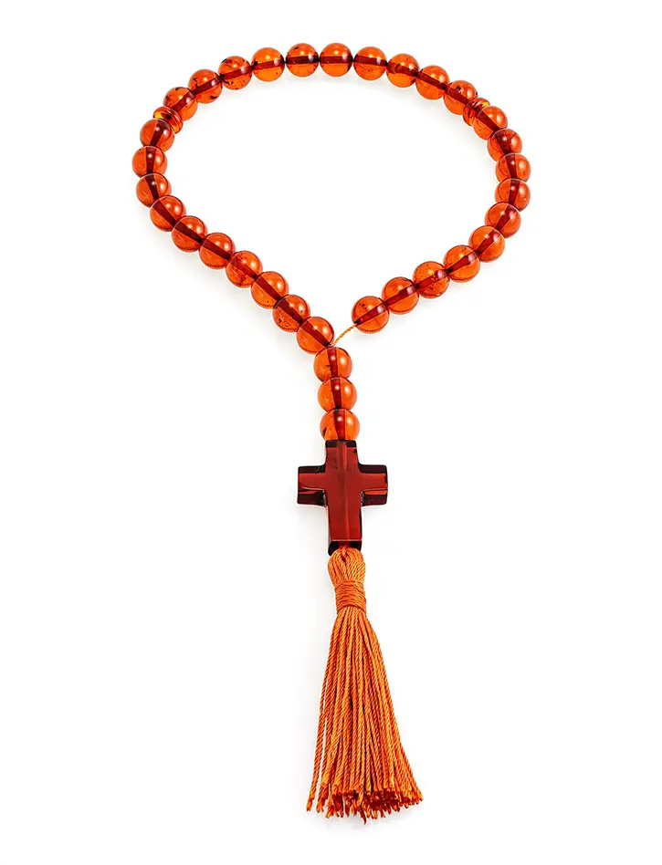 картинка Православные чётки с 33 бусинами-шарами и резным крестом из натурального цельного янтаря коньячного цвета в онлайн магазине
