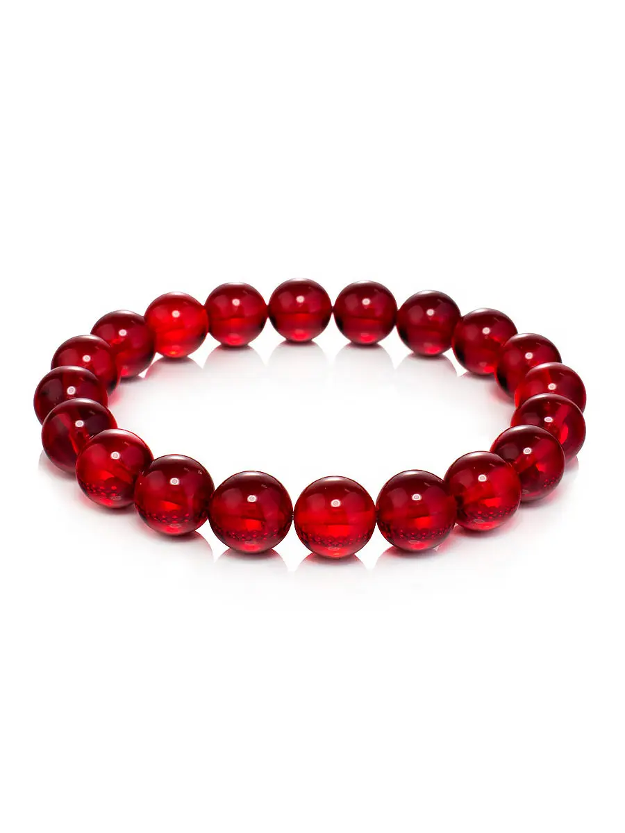 картинка Стильный браслет из натурального янтаря «Шар рубиновый» в онлайн магазине