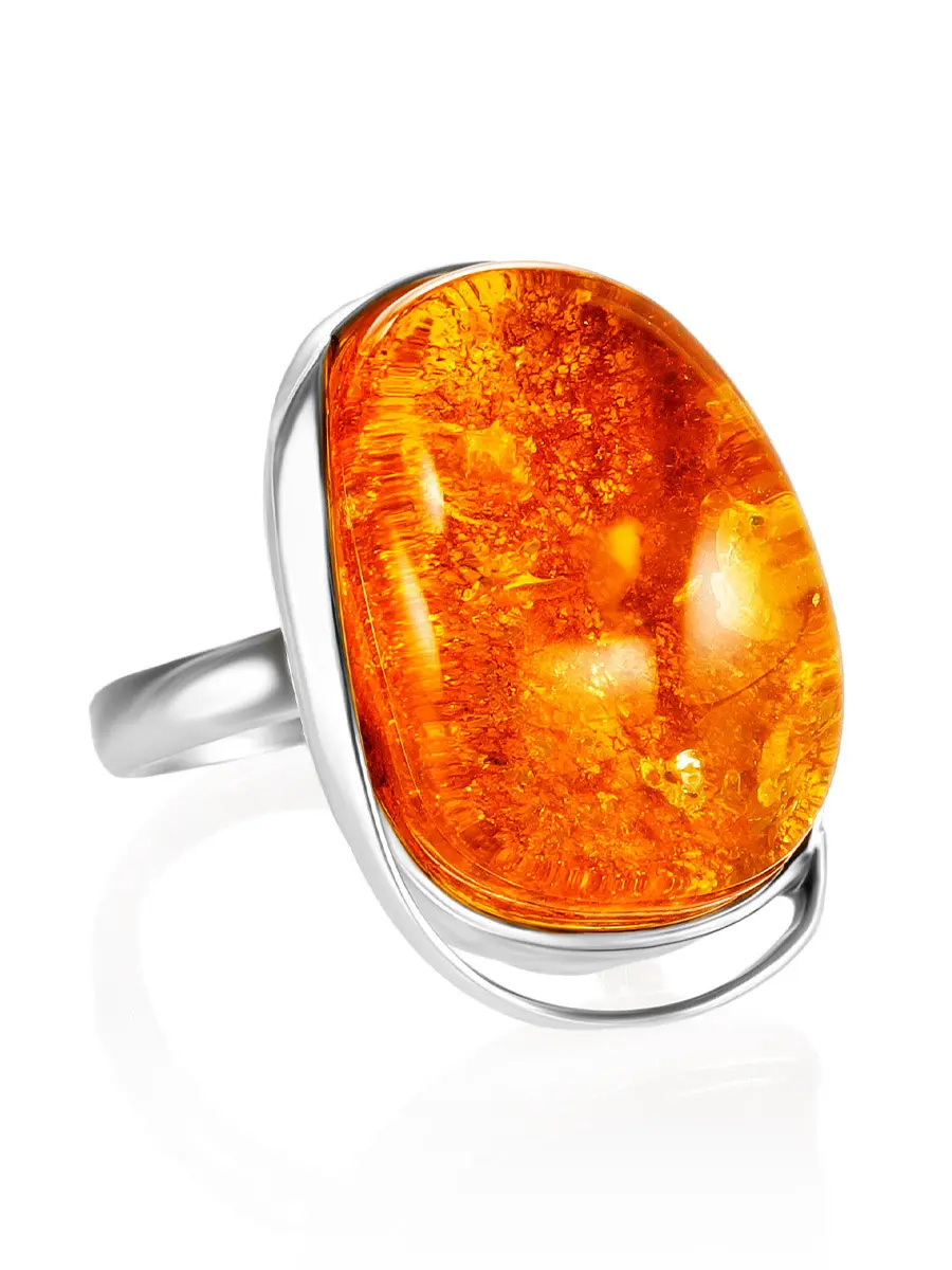 картинка Крупное кольцо с красивым золотистым янтарём «Лагуна» в онлайн магазине
