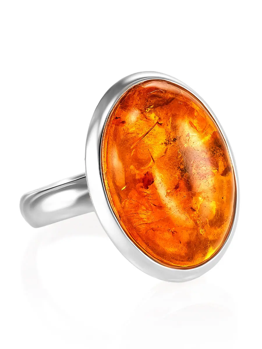 картинка Элегантное серебряное кольцо с вставкой из натурального искрящегося янтаря «Глянец» в онлайн магазине