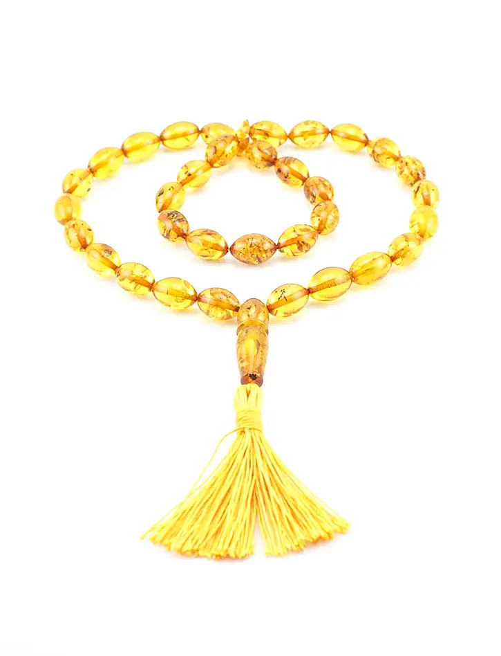 картинка Чётки из янтаря золотистого цвета с искорками (на 33 бусины) в онлайн магазине