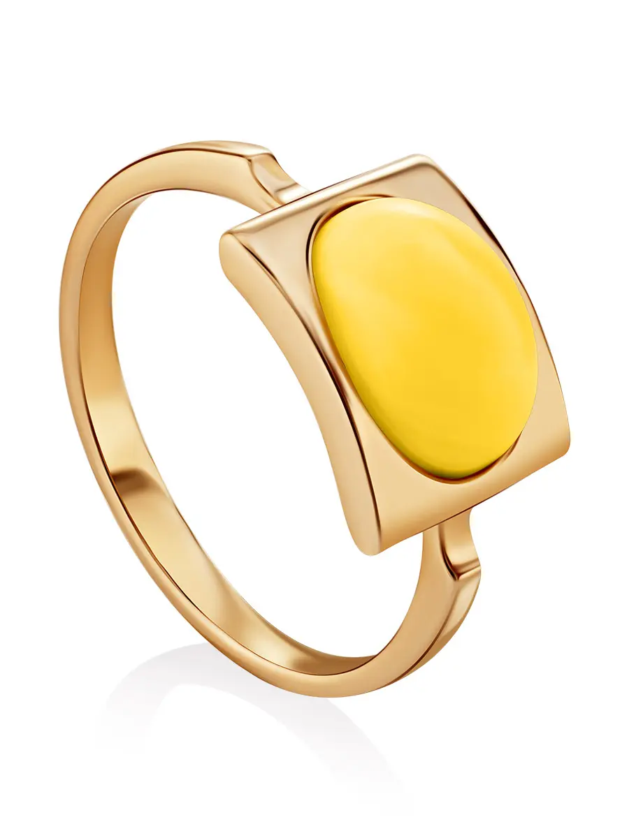картинка Стильное золотое кольцо со вставкой из натурального медового янтаря «Эллипс» в онлайн магазине