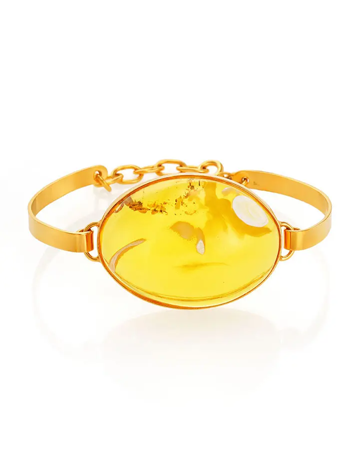 картинка Яркий браслет из позолоченного серебра, украшенный натуральным лимонным янтарём с уникальной текстурой в онлайн магазине