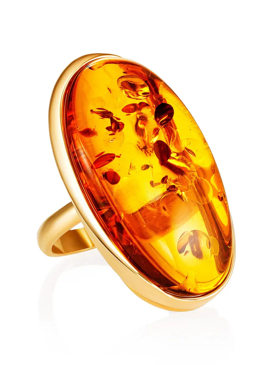 картинка Роскошное кольцо с искрящимся янтарём в золочённой оправе «Лагуна» в онлайн магазине