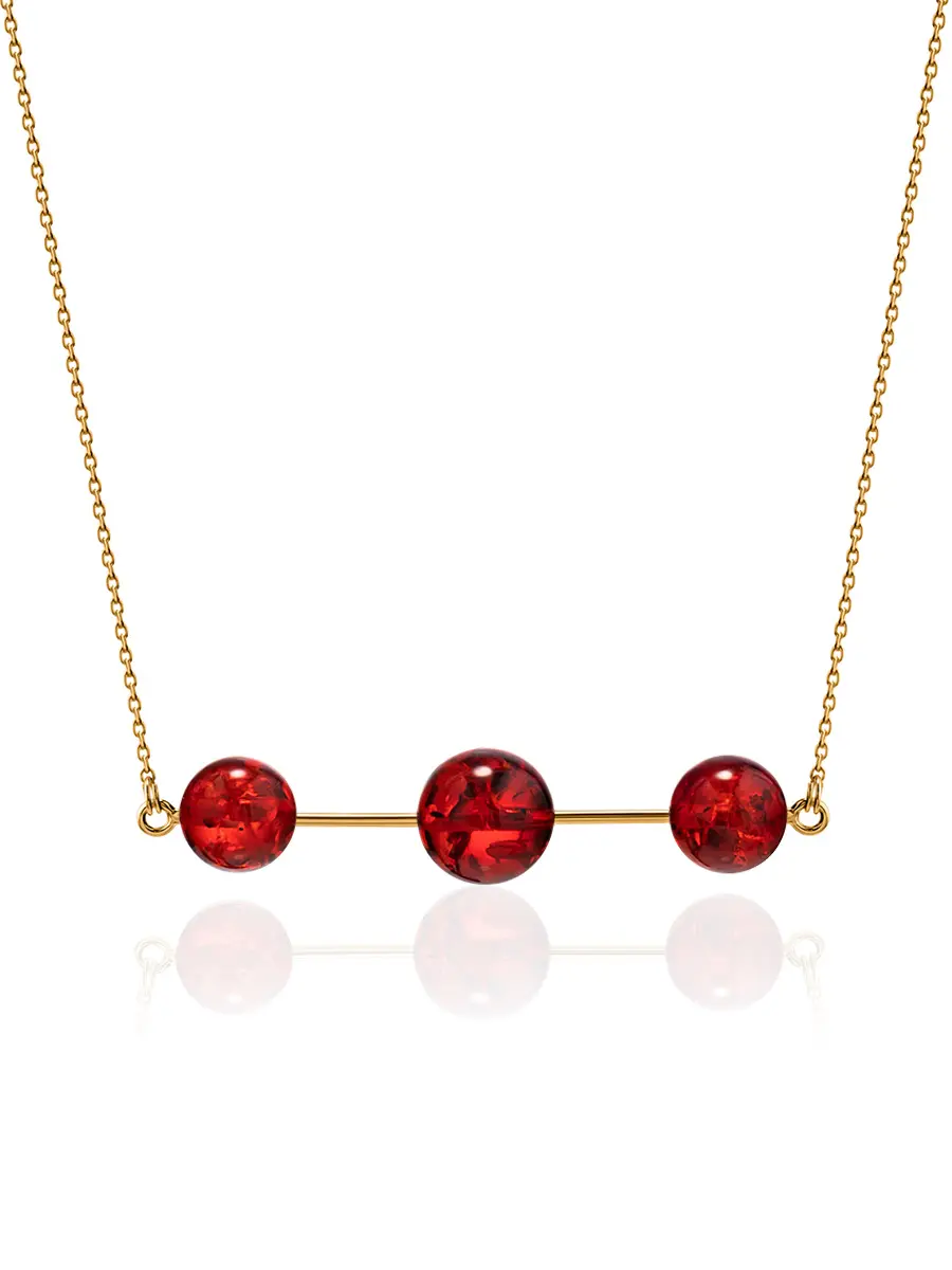картинка Стильное необычное колье из красного янтаря и позолоченного серебра «Париж» в онлайн магазине