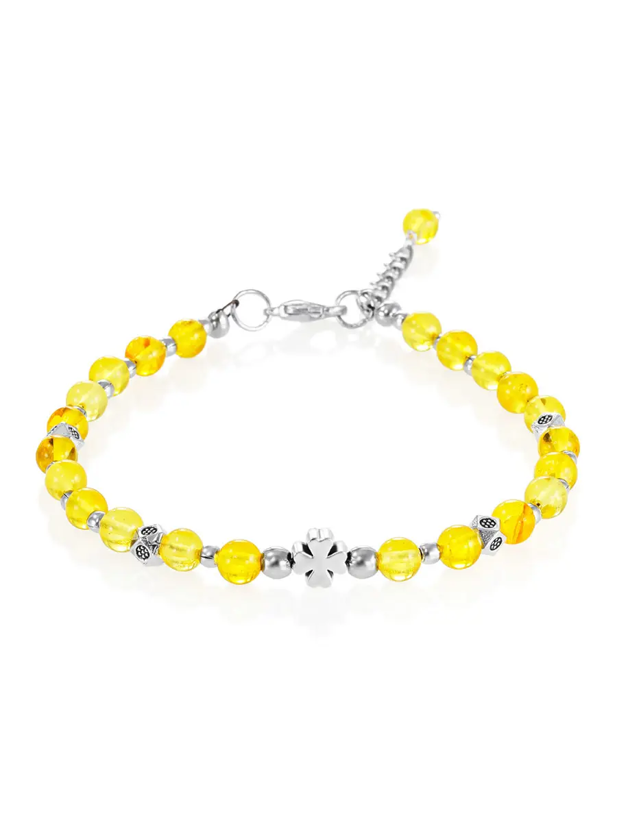 картинка Нежный изящный браслет из лимонного янтаря с декоративными вставками «Клевер» в онлайн магазине