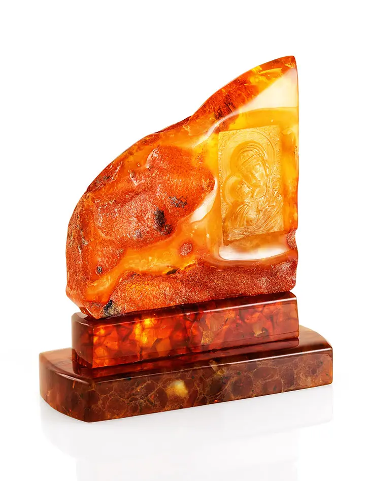 картинка Небольшая резная икона из натурального цельного янтаря с природной корочкой «Игоревская Богоматерь» в онлайн магазине