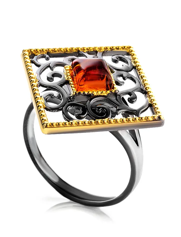 картинка Ажурное кольцо из коньячного янтаря «Арабеска» в онлайн магазине