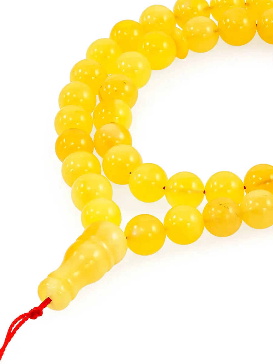 картинка Мусульманские чётки на 51 бусину из натурального янтаря медового цвета в онлайн магазине