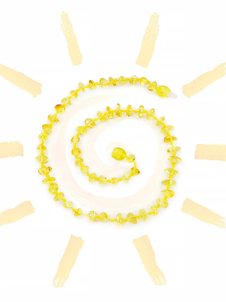 картинка Детские бусы из янтаря «Галька мелкая круглая золотисто-лимонная» в онлайн магазине