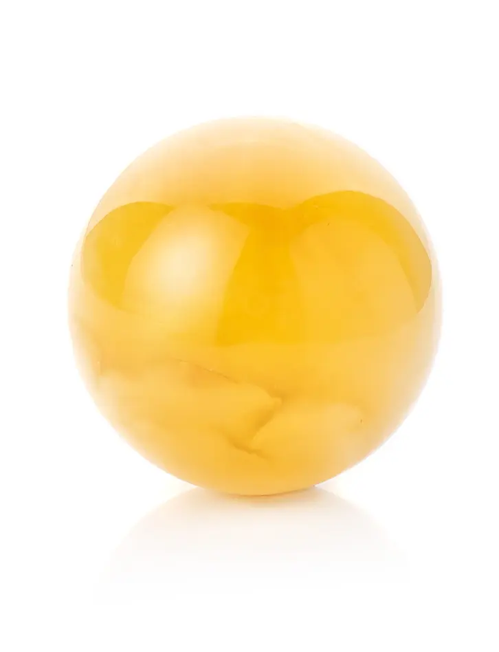 картинка Небольшой шар из цельного натурального янтаря медового цвета в онлайн магазине
