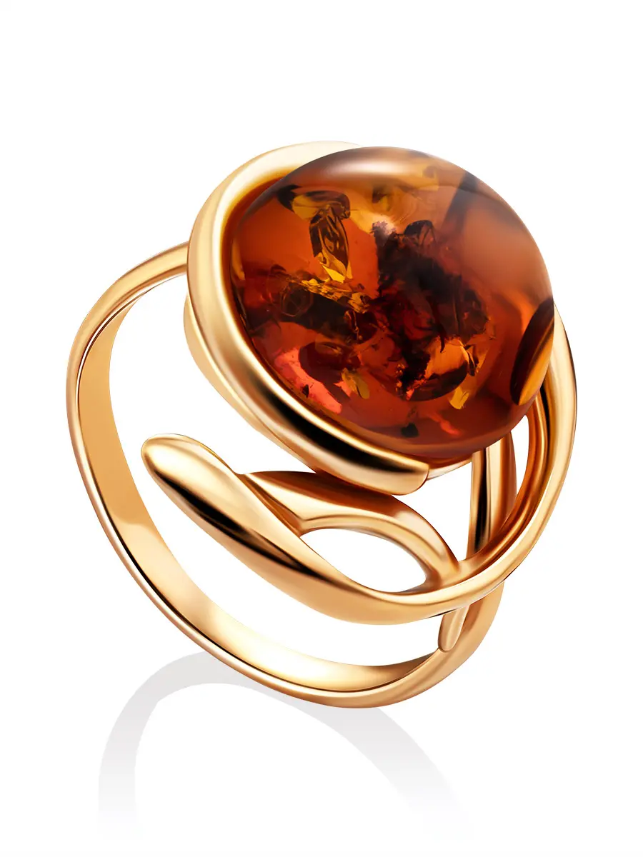 картинка Оригинальное крупное золочённое кольцо с коньячным янтарём «Феникс» в онлайн магазине