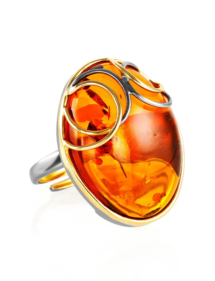 картинка Яркое овальное кольцо из цельного коньячного янтаря «Меридиан» в онлайн магазине