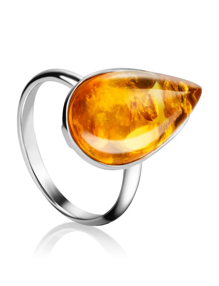 картинка Стильное серебряное кольцо «Импульс» с золотистым янтарём в онлайн магазине