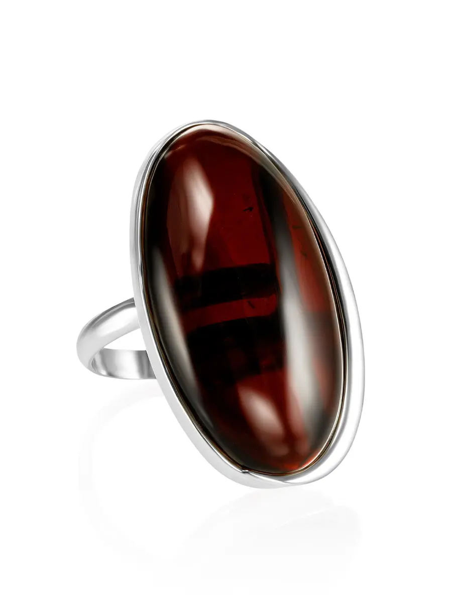 картинка Кольцо «Лагуна» с натуральным янтарём вишнёвого цвета в онлайн магазине