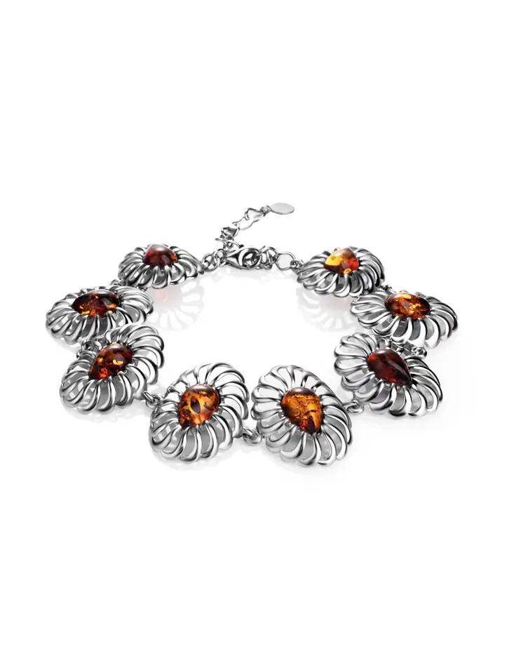 картинка Ажурный браслет из серебра и натурального балтийского янтаря яркого коньячного цвета «Севилья» в онлайн магазине