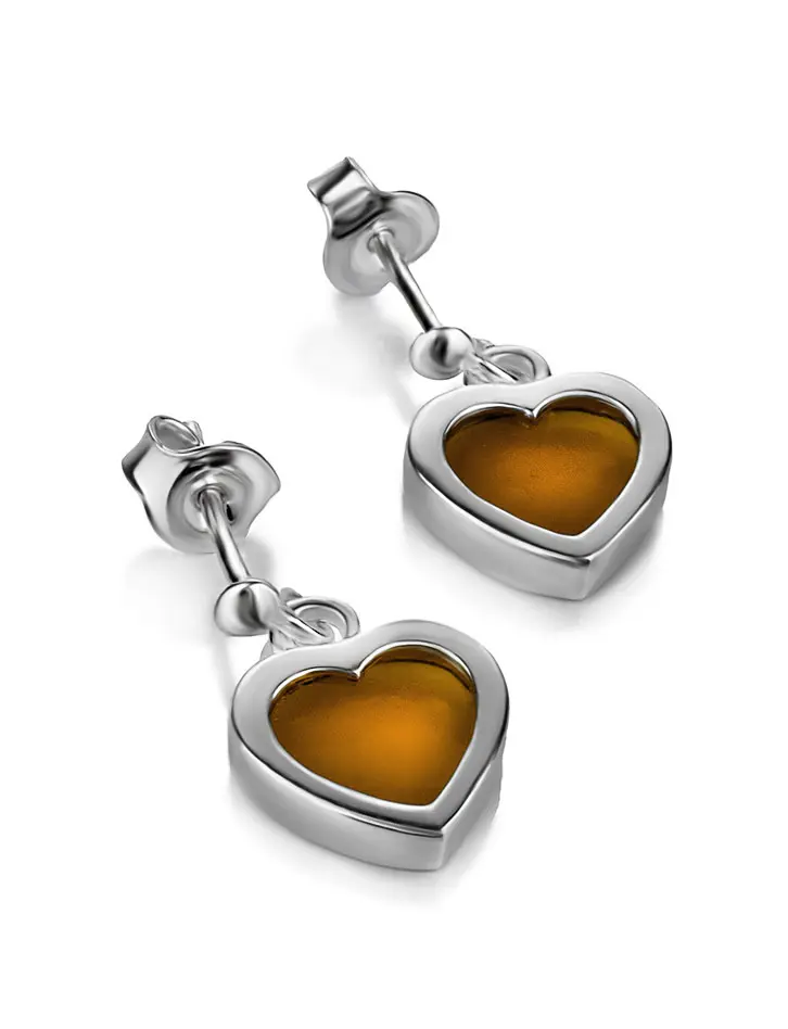 картинка Серьги-гвоздики из серебра с янтарной подвеской-сердцем коньячного цвета в онлайн магазине