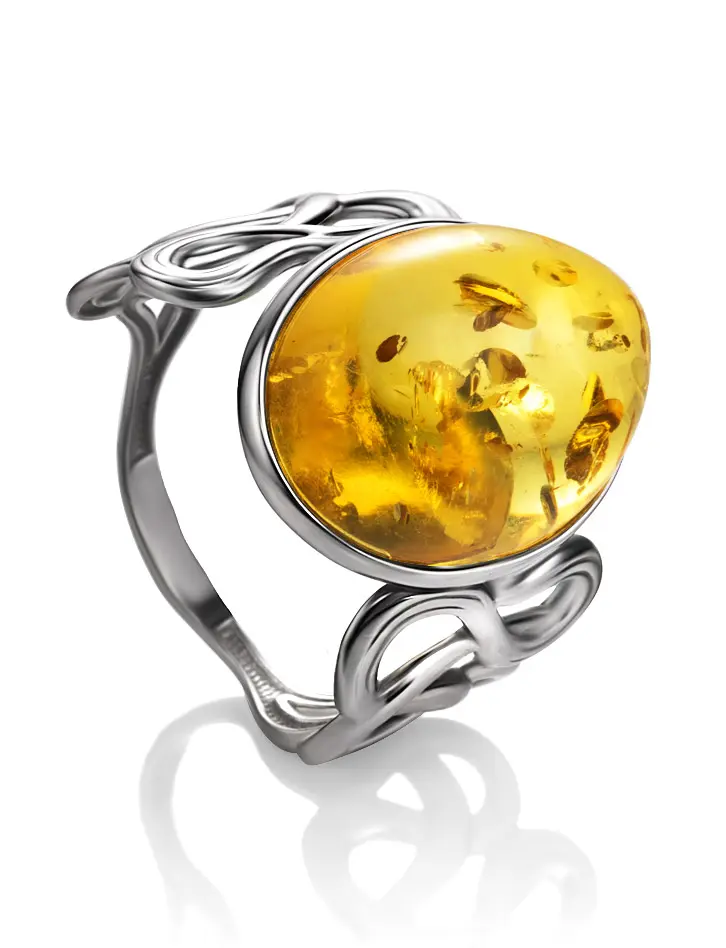 картинка Крупное кольцо из серебра с янтарём лимонного цвета «Чародейка» в онлайн магазине