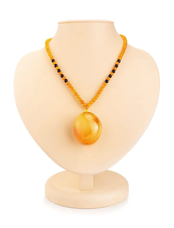 картинка Ожерелье «Лаура» из натурального цельного янтаря с объёмной текстурной подвеской в онлайн магазине