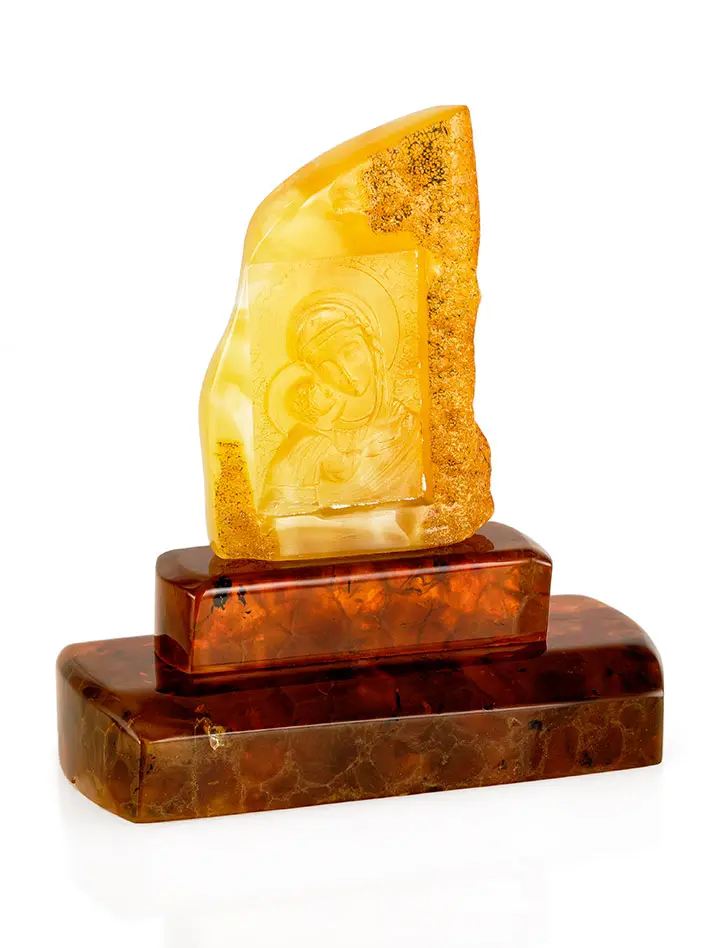 картинка Резьба на кусочке натурального лимонного янтаря на подставке «Игоревская Богоматерь» в онлайн магазине