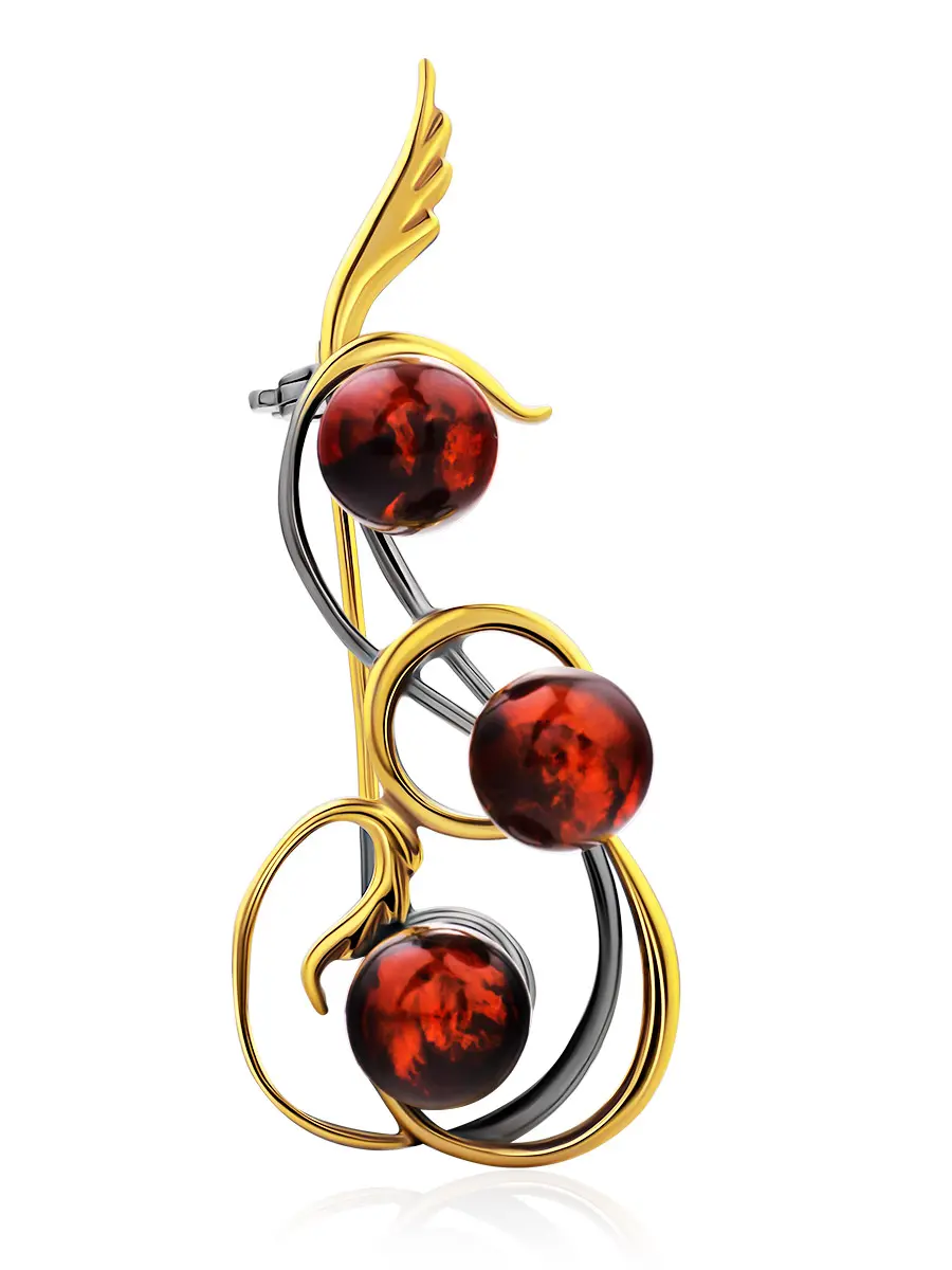 картинка Красивая ажурная брошь, украшенная тёмно-коньячным янтарём «Полонез» в онлайн магазине