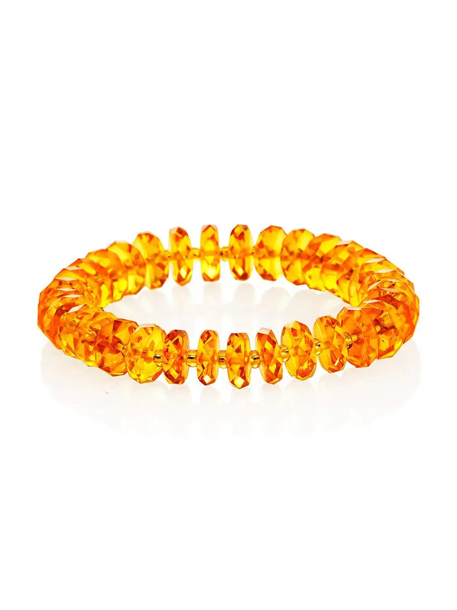 картинка Яркий нарядный браслет из натурального золотистого янтаря «Алмазная шайба» в онлайн магазине