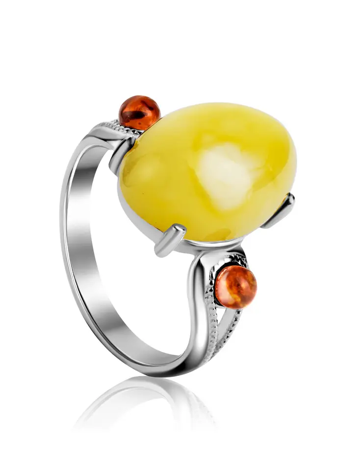 картинка Серебряное кольцо с натуральным медовым янтарем и вишневыми вставками «Стамбул» в онлайн магазине