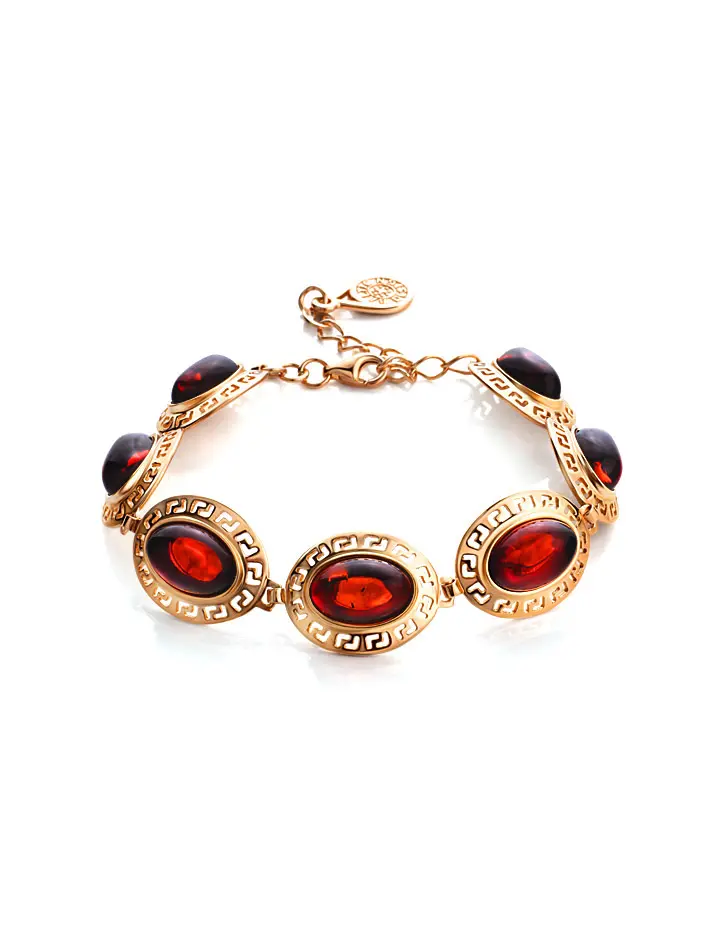 картинка Красивый браслет из позолоченного серебра с натуральным янтарём вишнёвого цвета «Эллада» в онлайн магазине