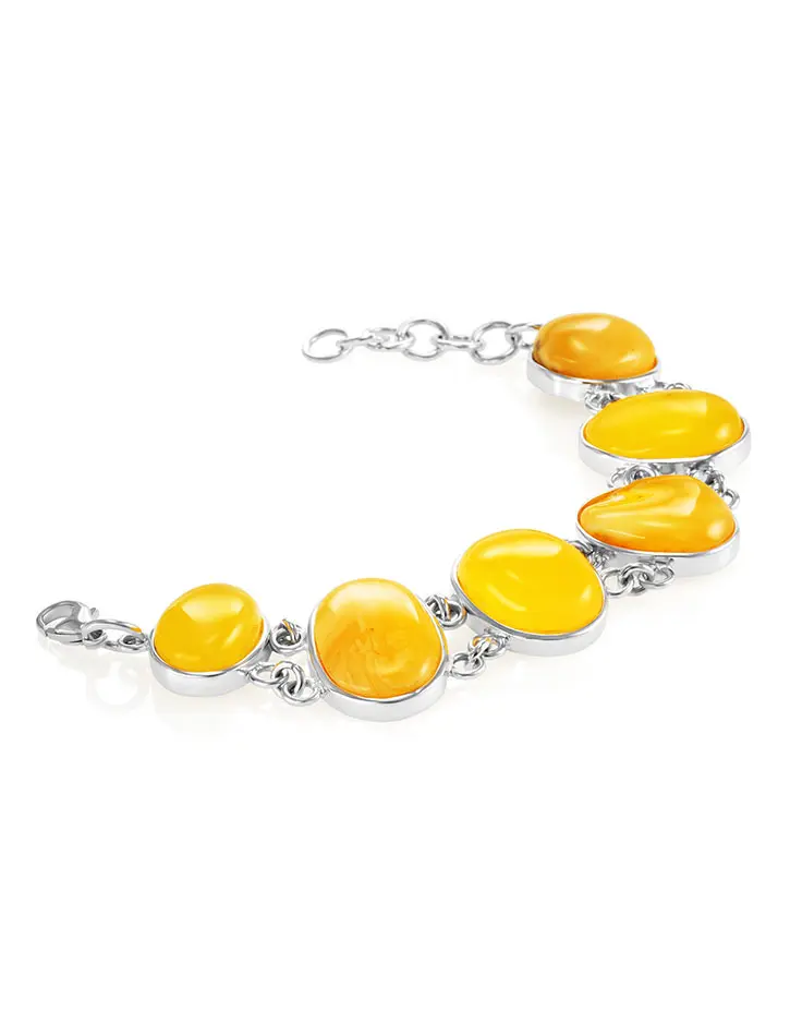 картинка Изысканный серебряный браслет с янтарём медового цвета «Глянец» в онлайн магазине