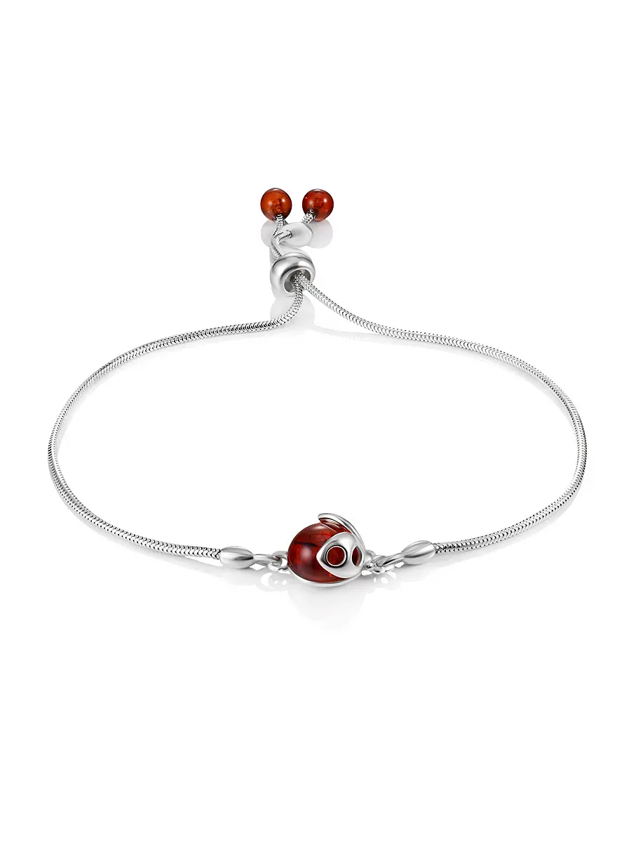 картинка Яркий браслет с янтарной вставкой коньячного оттенка «Божья коровка» в онлайн магазине