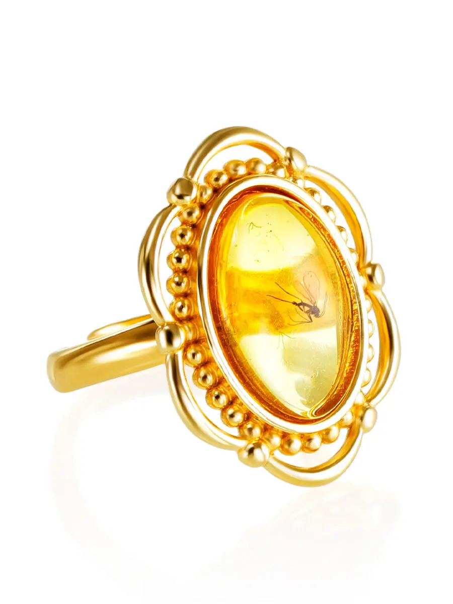 картинка Ажурное кольцо «Клио» из янтаря с инклюзом комара в онлайн магазине