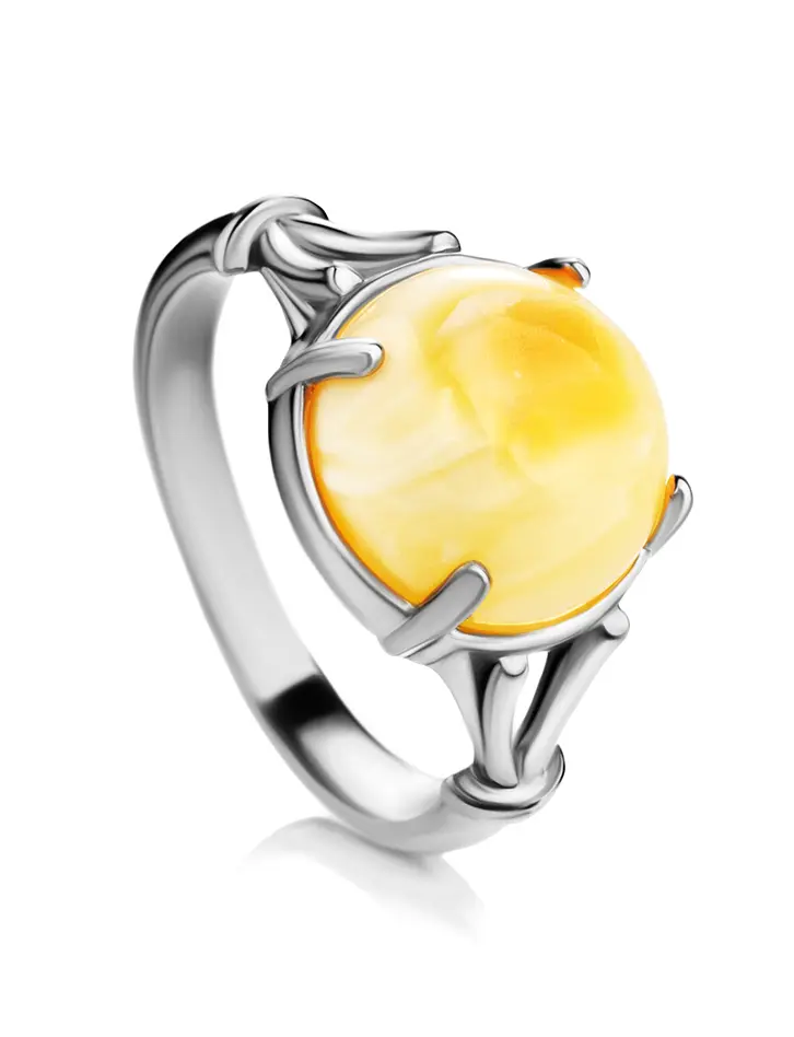 картинка Стильное кольцо из натурального медового янтаря в серебре «Шанхай» в онлайн магазине