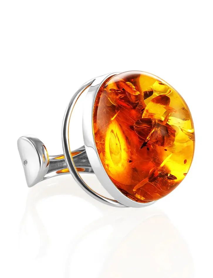 картинка Кольцо, украшенное натуральным искрящимся золотистым янтарём «Глянец» в онлайн магазине