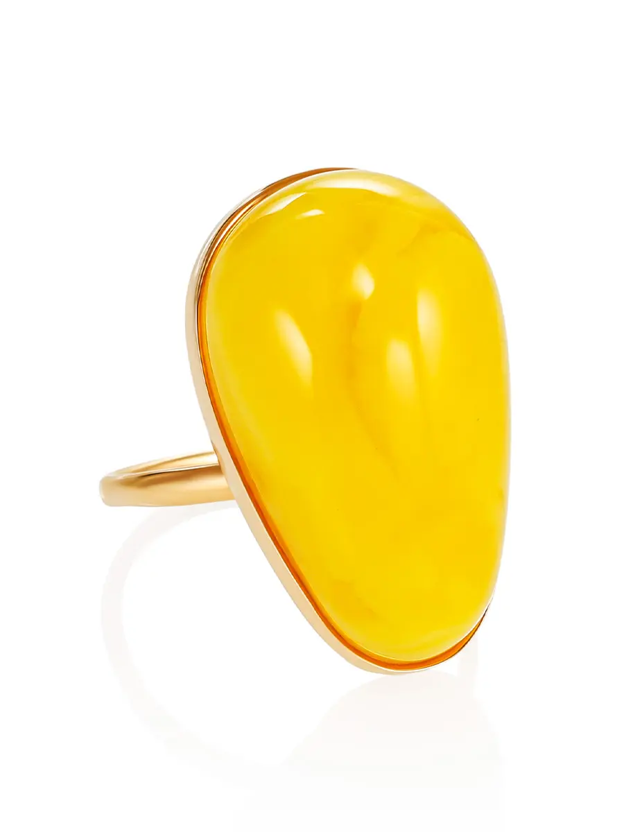 картинка Нежное золотое кольцо с натуральным янтарём медового цвета в онлайн магазине