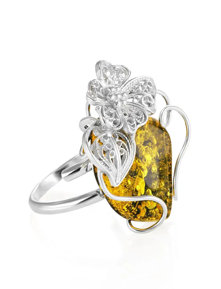 картинка Серебряное кольцо с крупной вставкой зеленого искрящегося янтаря «Филигрань» в онлайн магазине