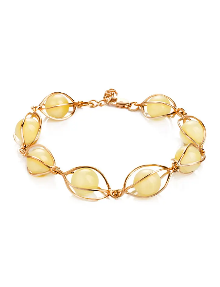 картинка Красивый позолоченный браслет с натуральным янтарём медового цвета «Алжир» в онлайн магазине