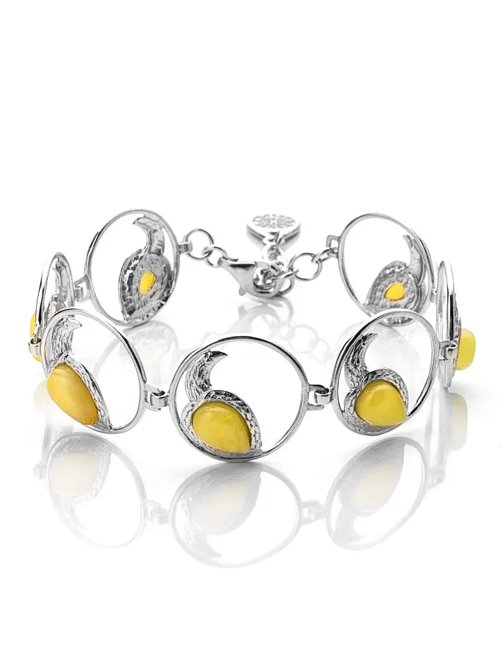 картинка Браслет из серебра и натурального цельного янтаря медового цвета «Лирика» в онлайн магазине