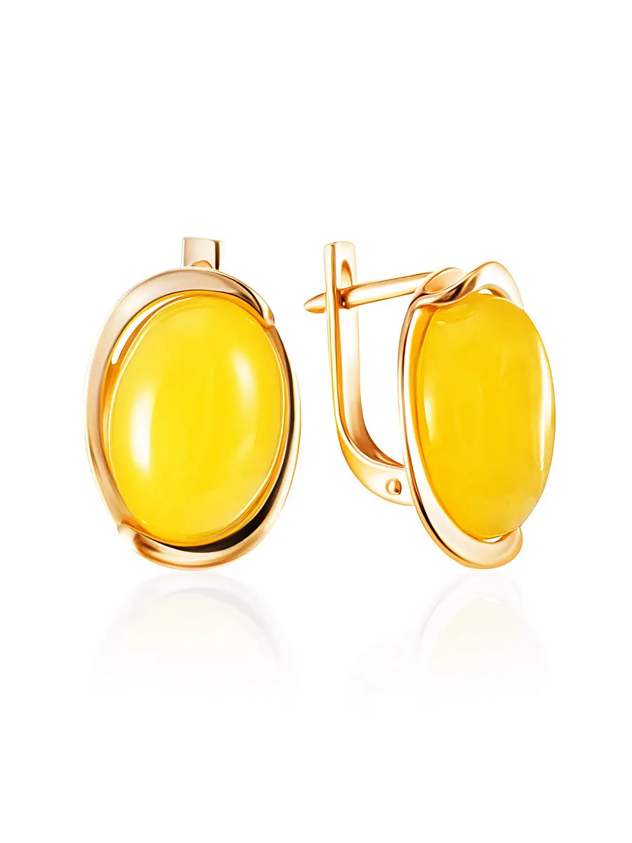 картинка Элегантные овальные серьги из золота и нежно-медового янтаря «Штраус» в онлайн магазине