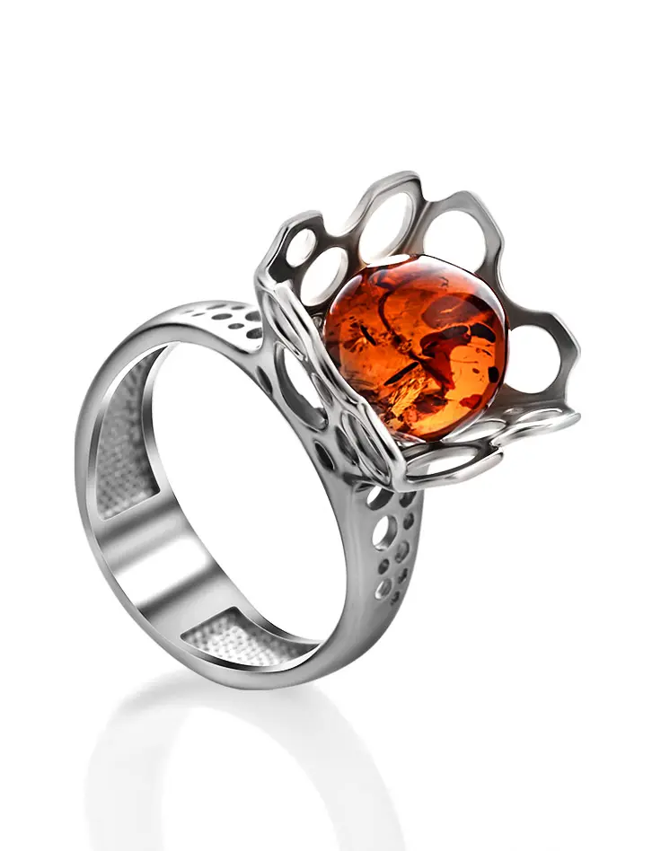 картинка Необычное кольцо из серебра с перфорацией и янтаря «Женева» в онлайн магазине