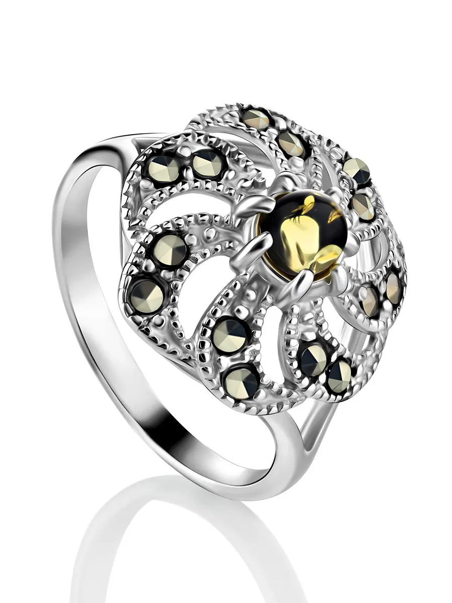 картинка Нарядное кольцо «Эйфория» из серебра и зелёного янтаря в онлайн магазине