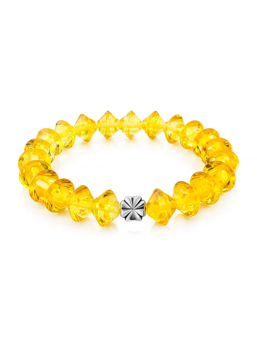 картинка Красивый браслет из лимонного янтаря с декоративным элементом «Юла» в онлайн магазине