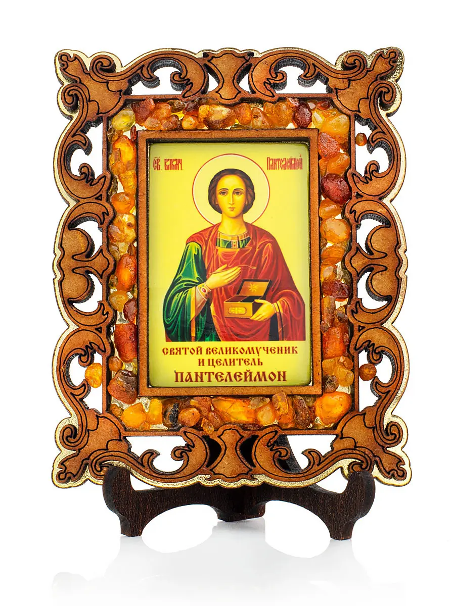 картинка «Святой целитель Пантелеймон». Небольшая иконка в резной деревянной оправе с магнитом, украшенная янтарём в онлайн магазине