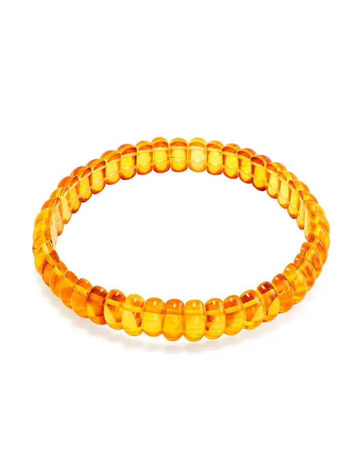 картинка Яркий браслет из цельного балтийского янтаря золотистого цвета в онлайн магазине
