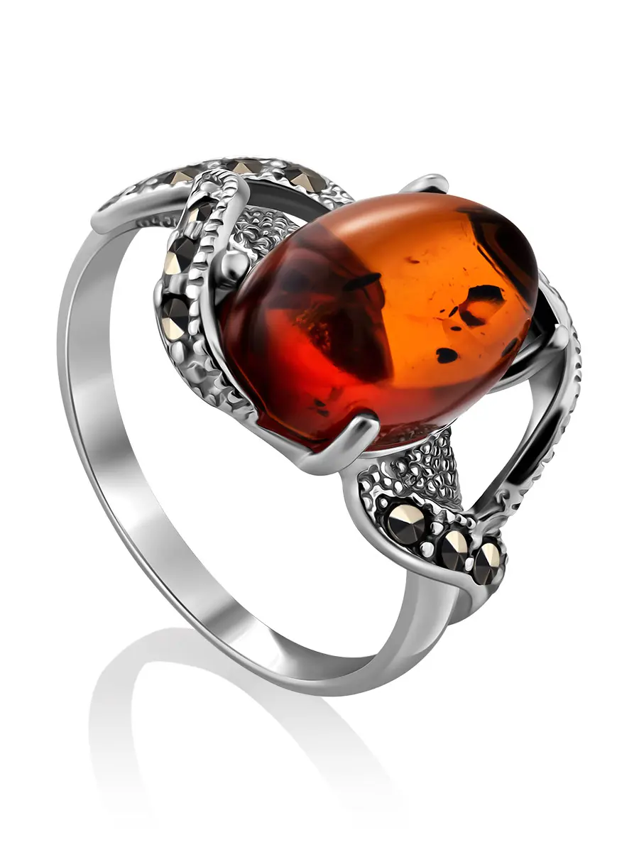 картинка Яркое красивое кольцо «Эйфория» из серебра с коньячным янтарем и марказитами в онлайн магазине