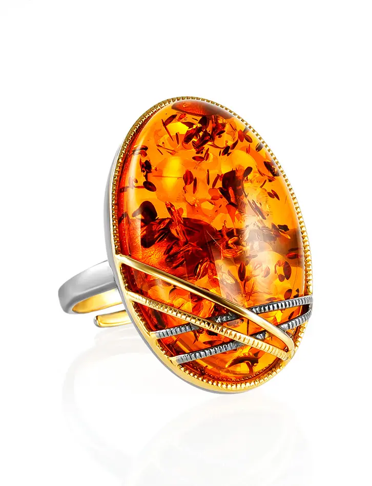 картинка Крупное яркое кольцо «Меридиан» из коньячного янтаря в позолоченной оправе в онлайн магазине