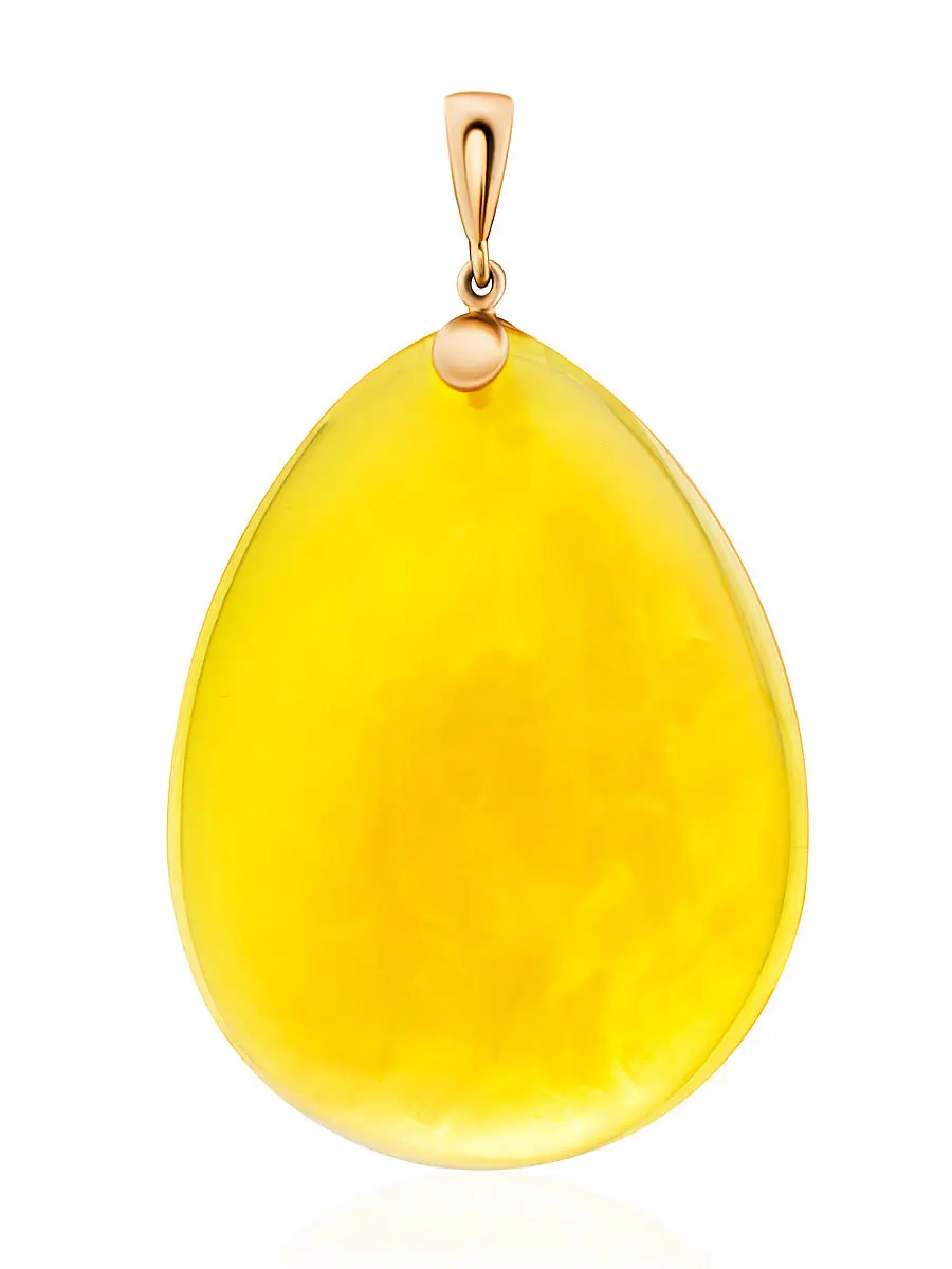 картинка Элегантная подвеска каплевидной формы из натурального полупрозрачного янтаря с золотом в онлайн магазине